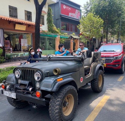 Bite into Ho Chi Minh City's Street Food Scene by Jeep
